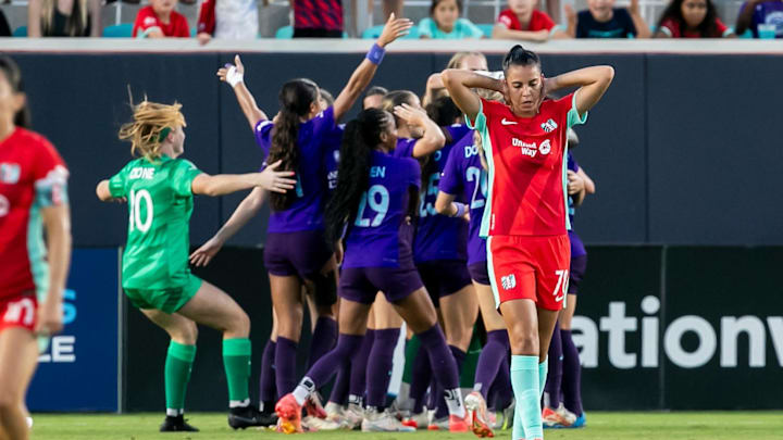 Jul 6, 2024; Kansas City, Missouri, USA; Kansas City Current defender Lauren (78) reacts as the Orlando Pride celebrate after a match at CPKC Stadium. Mandatory Credit: Nick Tre. Smith-USA TODAY Sports