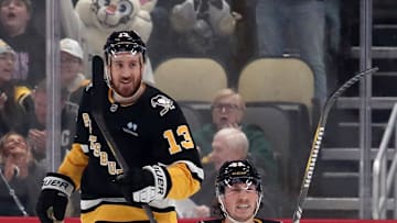 Jan 14, 2025; Pittsburgh, Pennsylvania, USA;  Pittsburgh Penguins center Philip Tomasino (53) celebrates after scoring a goal as right wing Kevin Hayes (13) looks on against the Seattle Kraken during the first period at PPG Paints Arena. Mandatory Credit: Charles LeClaire-Imagn Images