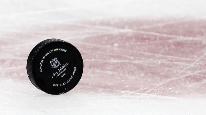 An NHL puck during a game.