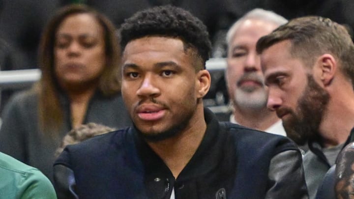 Feb 22, 2026; Milwaukee, Wisconsin, USA; Milwaukee Bucks forward Giannis Antetokounmpo (34) looks on from the bench in the second quarter against the Toronto Raptors as he recovers from a calf injury at Fiserv Forum. Mandatory Credit: Benny Sieu-Imagn Images