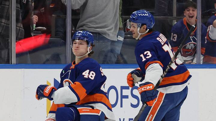 Jan 3, 2026; Elmont, New York, USA; New York Islanders defenseman Matthew Schaefer (48) celebrates with New York Islanders center Mathew Barzal (13) after scoring a goal against the Toronto Maple Leafs during the third period at UBS Arena. Mandatory Credit: Thomas Salus-Imagn Images