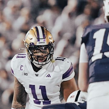 An ominous looking Alphonzo Tuputala stares down Penn State QB Drew Allar. 
