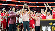 Nebraska coach Fred Hoiberg holds up the College Basketball Crown trophy after the Huskers beat UCF in the championship game.