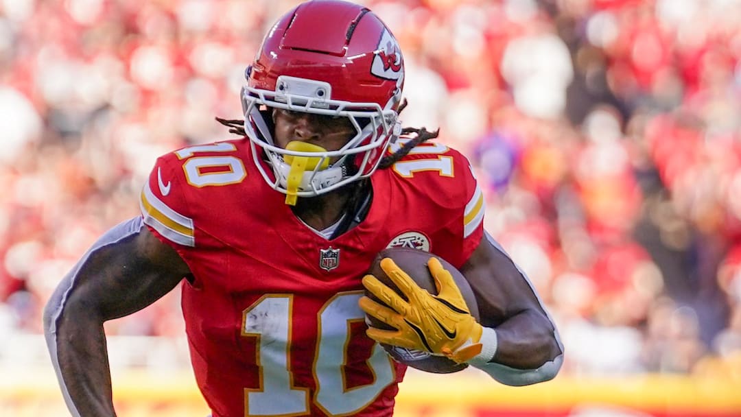 Sep 28, 2025; Kansas City, Missouri, USA; Kansas City Chiefs running back Isiah Pacheco (10) runs the ball against the Baltimore Ravens during the game at GEHA Field at Arrowhead Stadium.