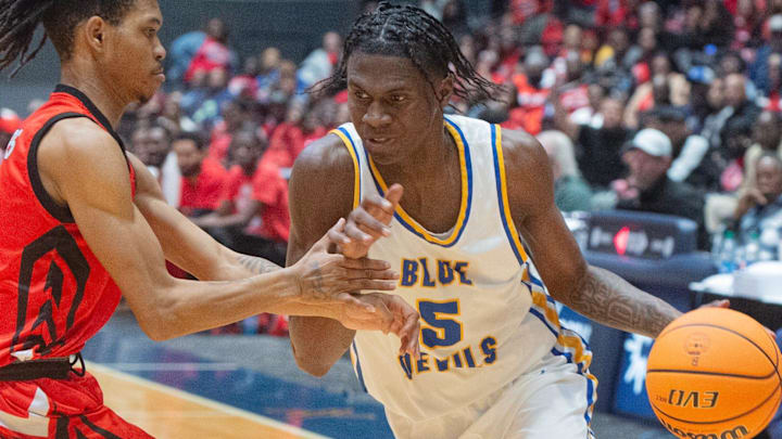 Booneville s Kendrick Simmon (5) shoots against Coahoma County during the MHSAA Class 3A girls basketball championship final game in Jackson, Miss., Saturday, March 1, 2024. Booneville s Kendrick Simmon (5) shoots against Coahoma County during the MHSAA Class 3A girls basketball championship final game in Jackson, Miss., Saturday, March 1, 2024.
