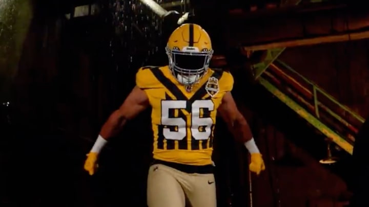 Steelers linebacker Alex Highsmith shows off the team's new throwback uniforms.