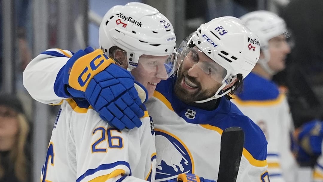 Jan 27, 2026; Toronto, Ontario, CAN; Buffalo Sabres forward Alex Tuch (89) congratulates defenseman Rasmus Dahlin (26) on his goal against the Toronto Maple Leafs during the third period at Scotiabank Arena. Mandatory Credit: John E. Sokolowski-Imagn Images