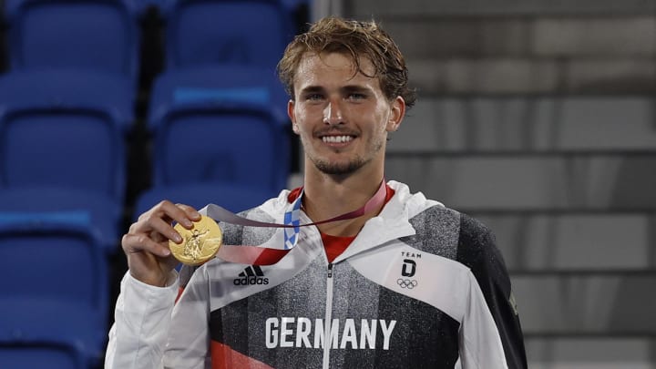 Aug 1, 2021; Tokyo, Japan; Alexander Zverev (GER) with his gold medal after the men's singles gold medal match during the Tokyo 2020 Olympic Summer Games at Ariake Tennis Park. 