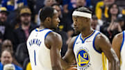Oct 8, 2025; San Francisco, California, USA;  Golden State Warriors forward Jimmy Butler III (10) reacts  towards forward Jonathan Kuminga (1) during the second quarter against the Portland Trail Blazers at Chase Center. Mandatory Credit: John Hefti-Imagn Images