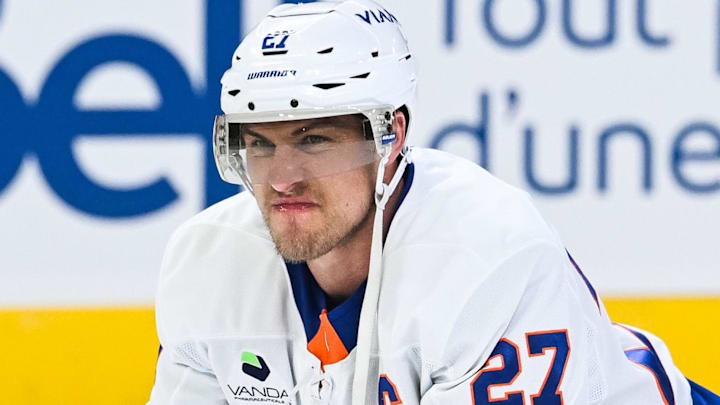 Mar 21, 2026; Montreal, Quebec, CAN; New York Islanders left wing Anders Lee (27) stretches during warm-up before the game against the Montreal Canadiens at Bell Centre. Mandatory Credit: David Kirouac-Imagn Images