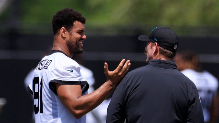 Jacksonville Jaguars defensive tackle Arik Armstead (91) talks with defensive coordinator Ryan Nielsen during an organized team activity Tuesday, May 28, 2024 at EverBank Stadium’s Miller Electric Center in Jacksonville, Fla.