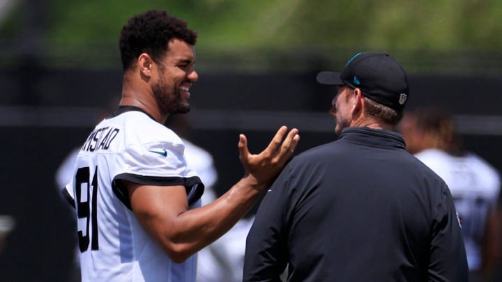 Jacksonville Jaguars defensive tackle Arik Armstead (91) talks with defensive coordinator Ryan Nielsen during an organized team activity Tuesday, May 28, 2024 at EverBank Stadium’s Miller Electric Center in Jacksonville, Fla.