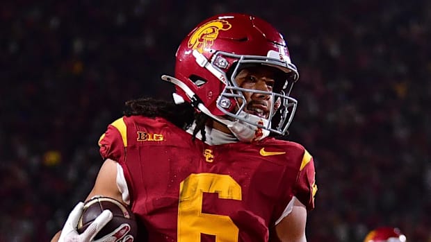 USC Trojans coach Lincoln Riley Michigan Wolverines coach Sherrone Moore Big Ten football College Football Playoff