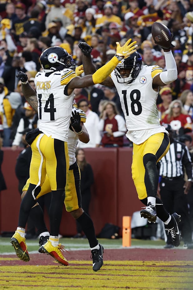 Pittsburgh Steelers wide receiver Mike Williams celebrates with Steelers wide receiver George Pickens