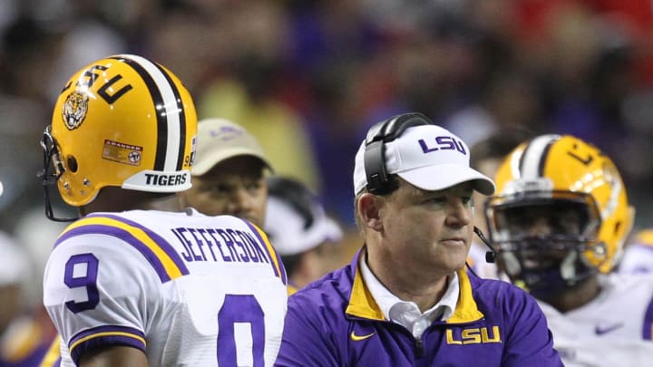 Dec 3, 2011; Atlanta, GA, USA; LSU Tigers head coach Les Miles reacts to Jordan Jefferson (9) against the Georgia Bulldogs during the first half of the 2011 SEC championship game at the Georgia Dome.  Mandatory Credit: Daniel Shirey-USA TODAY Sports