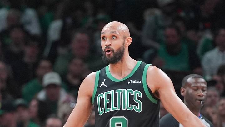 Apr 5, 2026; Boston, Massachusetts, USA; Boston Celtics guard Derrick White (9) reacts to a call on the court during the first half at TD Garden. Mandatory Credit: Gregory Fisher-Imagn Images