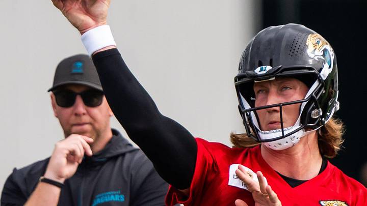 Jacksonville Jaguars quarterback Trevor Lawrence (16) passes as Jacksonville Jaguars head coach Liam Coen watches during the Jacksonville Jaguars’ mandatory minicamp Tuesday June 10, 2025 at the Miller Electric Center in Jacksonville, Fla.
