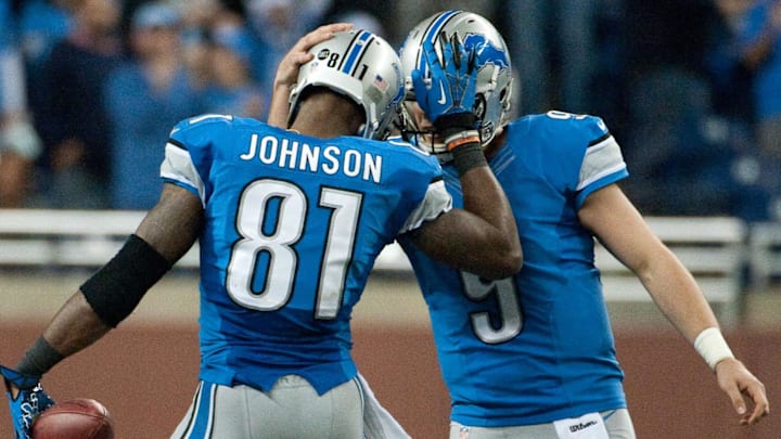 Detroit Lions quarterback Matthew Stafford congratulates wide receiver Calvin Johnson during the fourth quarter against the Atlanta Falcons. Detroit Lions quarterback Matthew Stafford congratulates wide receiver Calvin Johnson during the fourth quarter against the Atlanta Falcons.