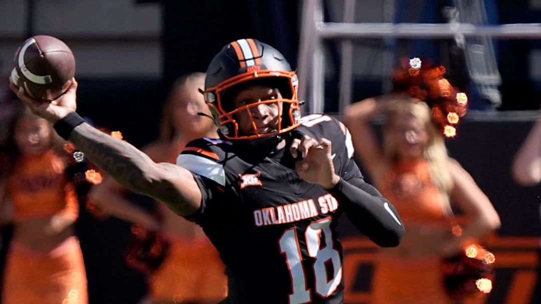 Oklahoma State Cowboys quarterback Sam Jackson V (18) throws an interception during a college football game between the Oklahoma State Cowboys (OSU) and the Houston Cougars at Boone Pickens Stadium in Stillwater, Okla., Saturday, Oct. 11, 2025.