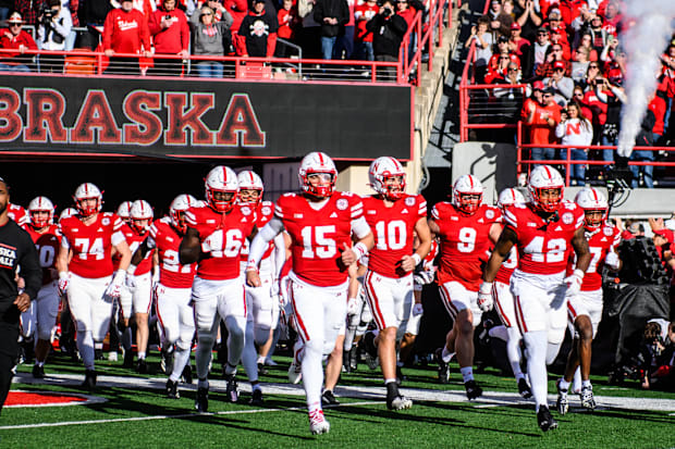 The Huskers run out to the field during the tunnel walk. 
