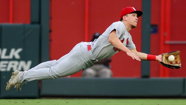 Sep 5, 2023; Atlanta, Georgia, USA; St. Louis Cardinals center fielder Tommy Edman (19) makes a diving catch against the Atlanta Braves in the second inning at Truist Park. Mandatory Credit: Brett Davis-USA TODAY Sports