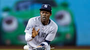Sep 20, 2024; Oakland, California, USA; New York Yankees third baseman Jazz Chisholm Jr. (13) fields a grounder during the third inning against the Oakland Athletics at Oakland-Alameda County Coliseum. Mandatory Credit: Bob Kupbens-Imagn Images