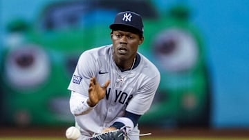 Sep 20, 2024; Oakland, California, USA; New York Yankees third baseman Jazz Chisholm Jr. (13) fields a grounder during the third inning against the Oakland Athletics at Oakland-Alameda County Coliseum. Mandatory Credit: Bob Kupbens-Imagn Images