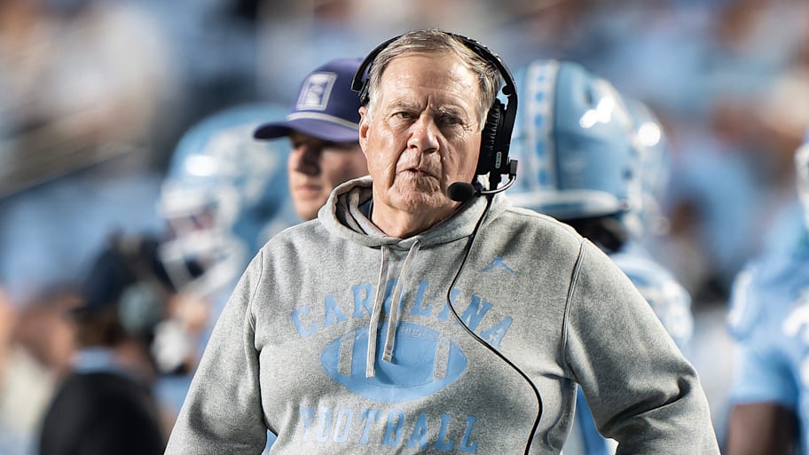 Bill Belichick stands with one hand on his hip during the game against TCU.