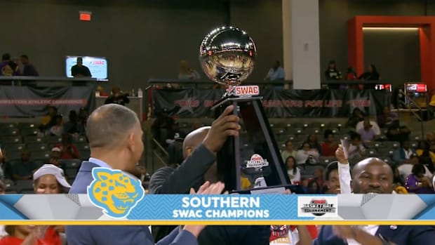 Coach Funchess Hoists SWAC Tournament Trophy