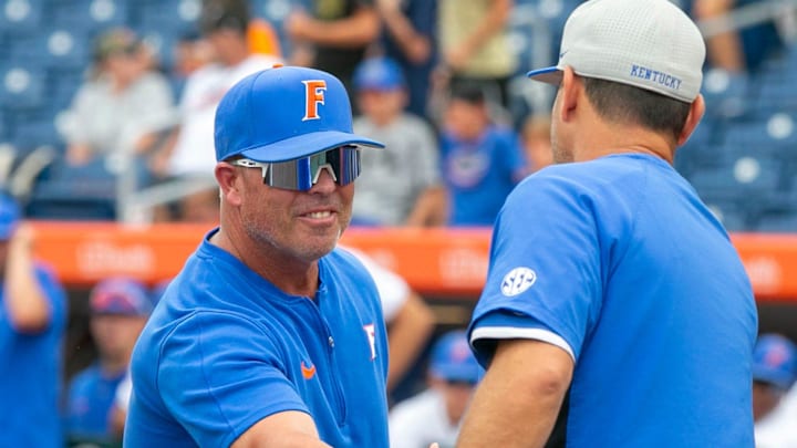 Florida head coach Kevin O'Sullivan (7) and Kentucky head coach Nick Mingione (27) shake heads before the start of Game 1, Friday, May 10, 2024, at Condron Family Ballpark in Gainesville, Florida. The Gators lost 12-11 in extra innings. [Cyndi Chambers/ Gainesville Sun] 2024