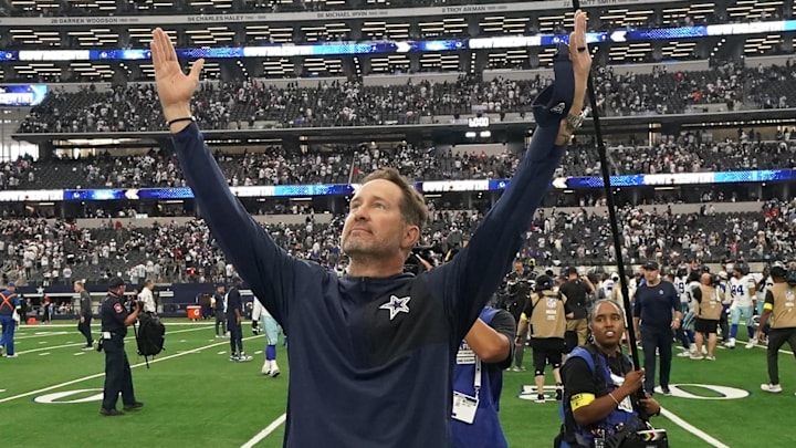 Sep 14, 2025; Arlington, Texas, USA; Dallas Cowboys head coach Brian Schottenheimer gestures to fans after the game against the New York Giants at AT&T Stadium. Mandatory Credit: Raymond Carlin III-Imagn Images