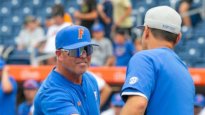Florida head coach Kevin O'Sullivan (7) and Kentucky head coach Nick Mingione (27) shake heads before the start of Game 1, Friday, May 10, 2024, at Condron Family Ballpark in Gainesville, Florida. The Gators lost 12-11 in extra innings. [Cyndi Chambers/ Gainesville Sun] 2024