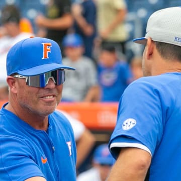 Florida head coach Kevin O'Sullivan (7) and Kentucky head coach Nick Mingione (27) shake heads before the start of Game 1, Friday, May 10, 2024, at Condron Family Ballpark in Gainesville, Florida. The Gators lost 12-11 in extra innings. [Cyndi Chambers/ Gainesville Sun] 2024