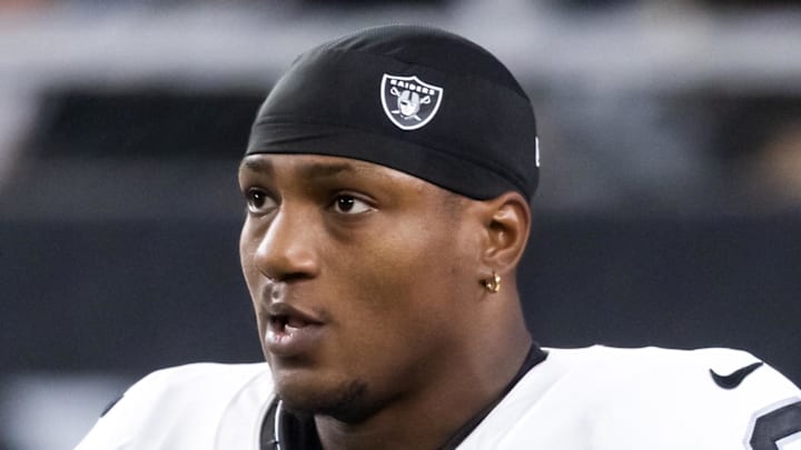 Aug 23, 2025; Glendale, Arizona, USA; Las Vegas Raiders running back Zamir White (3) against the Arizona Cardinals during a preseason NFL game at State Farm Stadium. Mandatory Credit: Mark J. Rebilas-Imagn Images