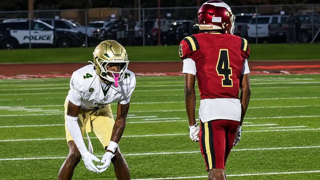 Long Beach Poly DB Donte Wright lines up to defend Poly wide receiver Damani Porras.