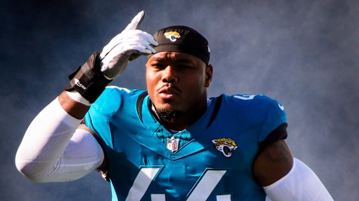 Jacksonville Jaguars defensive end Travon Walker (44) enters the stadium before an NFL football game at EverBank Stadium, Sunday, Dec. 14, 2025, in Jacksonville, Fla. 