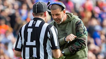 Florida Gators head coach Billy Napier has words with a lineman referee at Steve Spurrier Field at Ben Hill Griffin Stadium in Gainesville, FL on Saturday, November 4, 2023 in the second half. Arkansas defeated Florida 39-36 in over-time. [Doug Engle/Gainesville Sun]