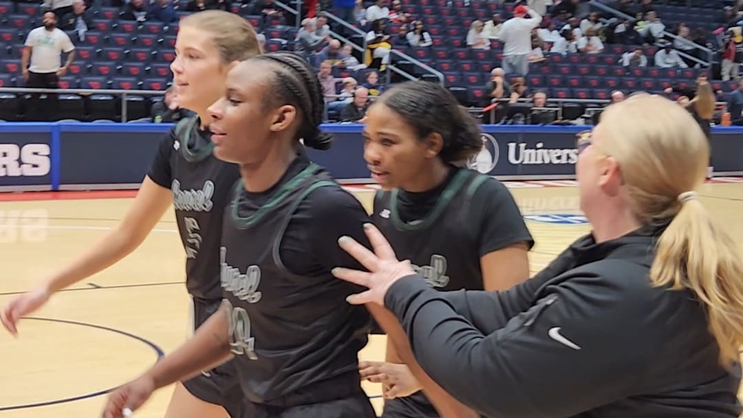 Laurel's Tristan Williams, front left, walks over to celebrate with her team after the Gators won the 2026 OHSAA Division IV state championship game. 