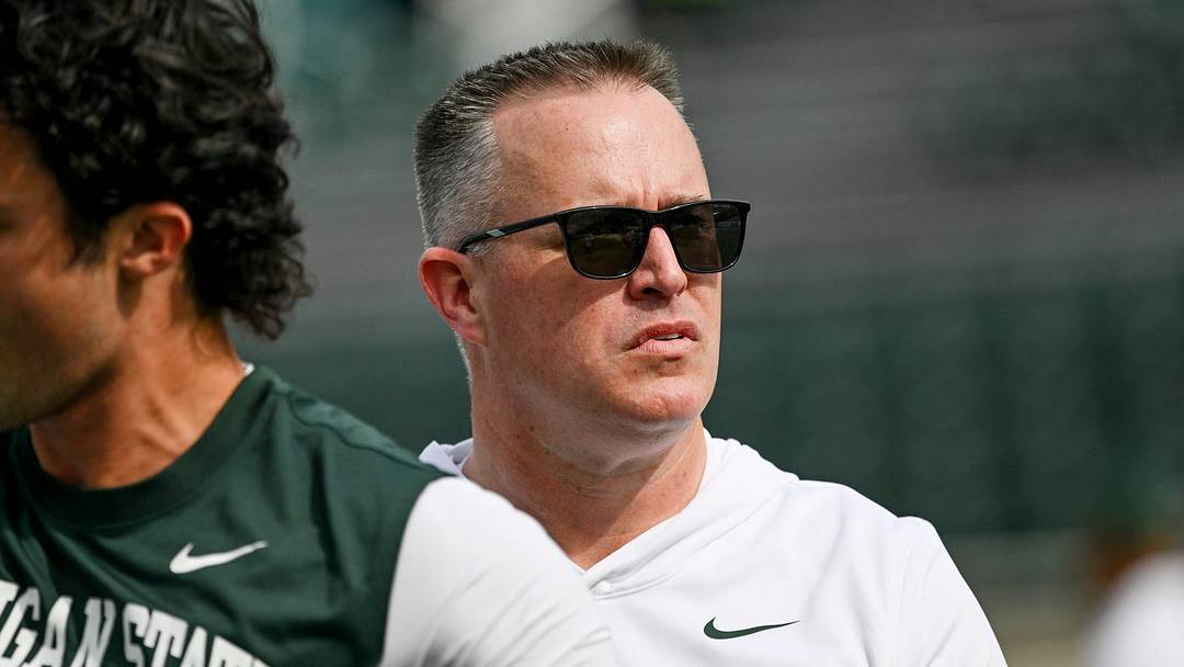 Michigan State’s head coach Pat Fitzgerald looks on as the team warms up before the game against Illinois on Saturday, Oct. 10, 2026, at Spartan Stadium in East Lansing.