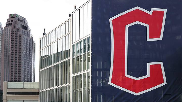 A banner with the Cleveland Guardians' new logo hangs from a parking deck before an MLB baseball game between the Cleveland Guardians and the San Francisco Giants at Progressive Field.