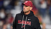 Alabama Crimson Tide head coach Kalen DeBoer watches on during warm ups before Auburn Tigers take on Alabama Crimson Tide at Jordan-Hare Stadium in Auburn, Ala. on Saturday, Nov. 29, 2025.
