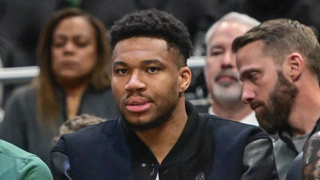 Milwaukee Bucks forward Giannis Antetokounmpo (34) looks on from the bench in the second quarter against the Toronto Raptors as he recovers from a calf injury at Fiserv Forum on February 22, 2026.