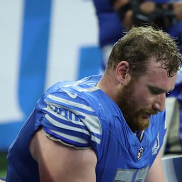 Detroit Lions center Frank Ragnow (77) on the sidelines during action against the Atlanta Falcons in 2023