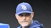 Aug 26, 2025; Cleveland, Ohio, USA; Tampa Bay Rays manager Kevin Cash (16) stands in the dugout in the first inning against the Cleveland Guardians at Progressive Field. 