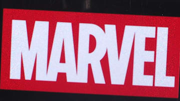 In this photo illustration, Marvel Entertainment logo seen...