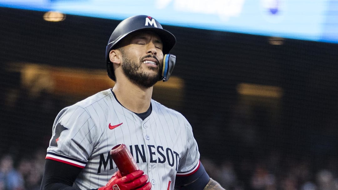 Jul 12, 2024; San Francisco, California, USA; Minnesota Twins shortstop Carlos Correa (4) reacts after taking  a strike against the San Francisco Giants during the fourth inning at Oracle Park. Mandatory Credit: John Hefti-Imagn Images
