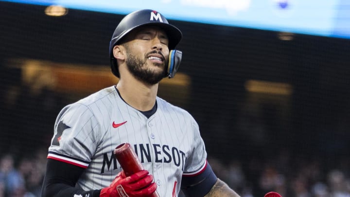 Jul 12, 2024; San Francisco, California, USA; Minnesota Twins shortstop Carlos Correa (4) reacts after taking  a strike against the San Francisco Giants during the fourth inning at Oracle Park.