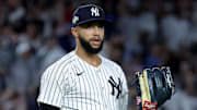 Oct 1, 2025; Bronx, New York, USA; New York Yankees relief pitcher Devin Williams (38) reacts during the eighth inning of game two of the Wildcard round of the 2025 MLB playoffs against the Boston Red Sox at Yankee Stadium. Mandatory Credit: Brad Penner-Imagn Images