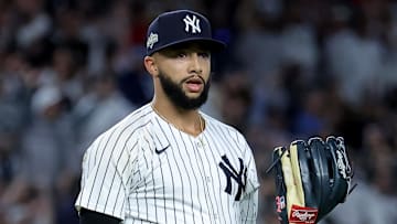 Oct 1, 2025; Bronx, New York, USA; New York Yankees relief pitcher Devin Williams (38) reacts during the eighth inning of game two of the Wildcard round of the 2025 MLB playoffs against the Boston Red Sox at Yankee Stadium. Mandatory Credit: Brad Penner-Imagn Images