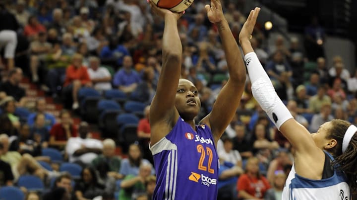 Jul 24, 2013; Minneapolis, MN, USA; Phoenix Mercury forward Charde Houston (22) takes a shot in the fourth quarter against the Minnesota Lynx at Target Center. The Lynx defeated the Mercury 81-69. Mandatory Credit: Marilyn Indahl-Imagn Images Jul 24, 2013; Minneapolis, MN, USA; Phoenix Mercury forward Charde Houston (22) takes a shot in the fourth quarter against the Minnesota Lynx at Target Center. The Lynx defeated the Mercury 81-69. Mandatory Credit: Marilyn Indahl-Imagn Images